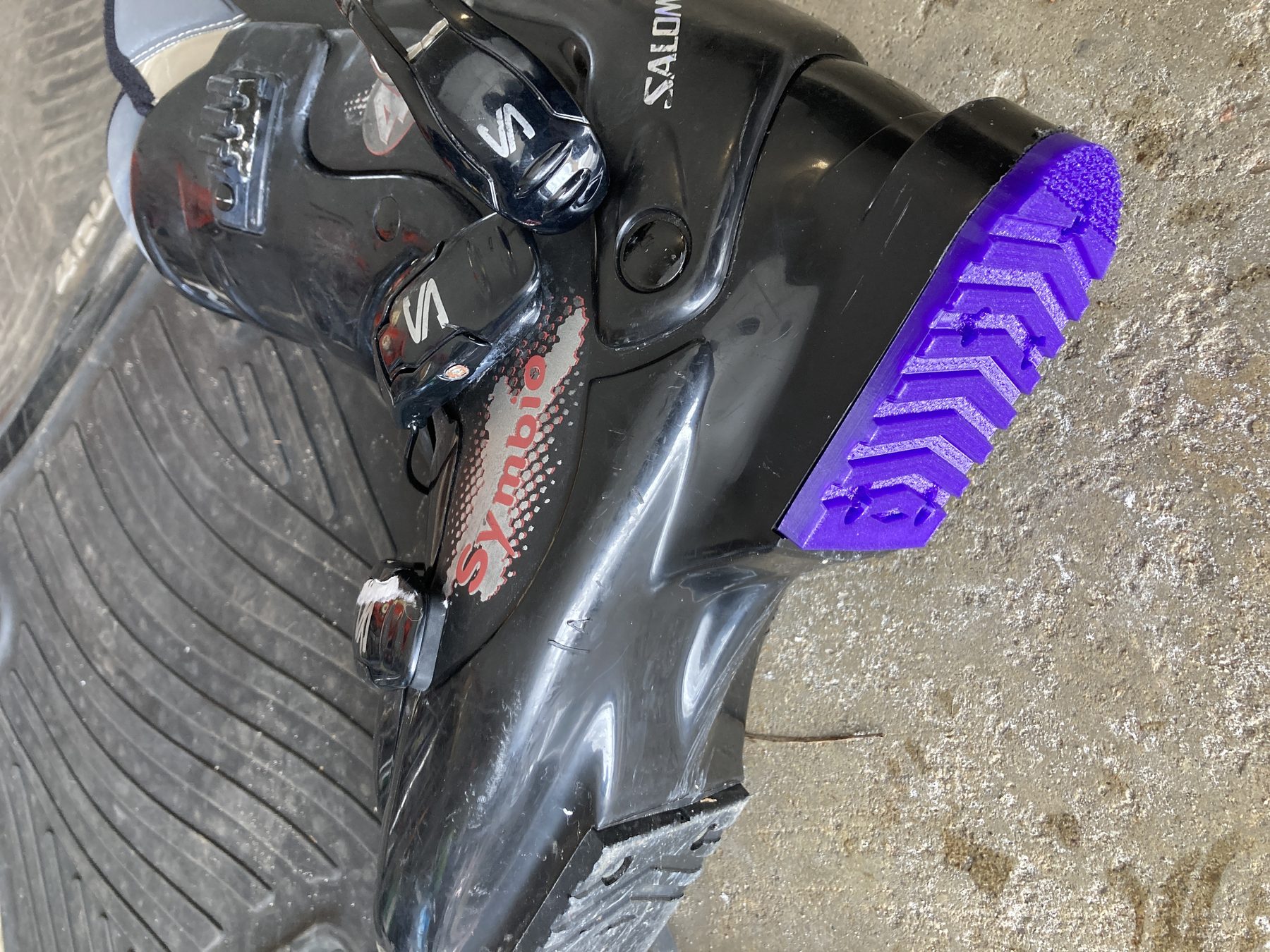 A repaired ski boot with a 3D printed replacement part